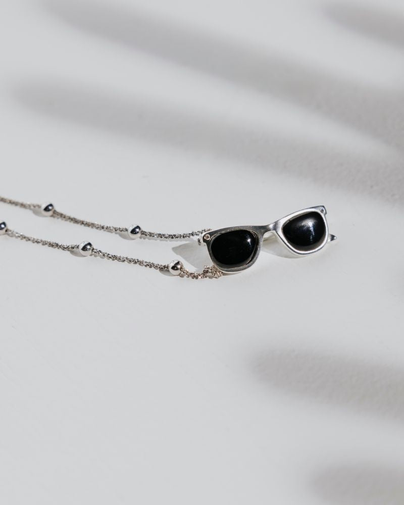 Colgante Unisex gafas plata onix_Joyería Artesanal Sostenible_Luz de Nehca