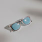 Colgante Unisex gafas de plata con piedra turquesa_Luz de Nehca_Joyeria Artesanal Sostenible con circonitas de cuarzo rosa