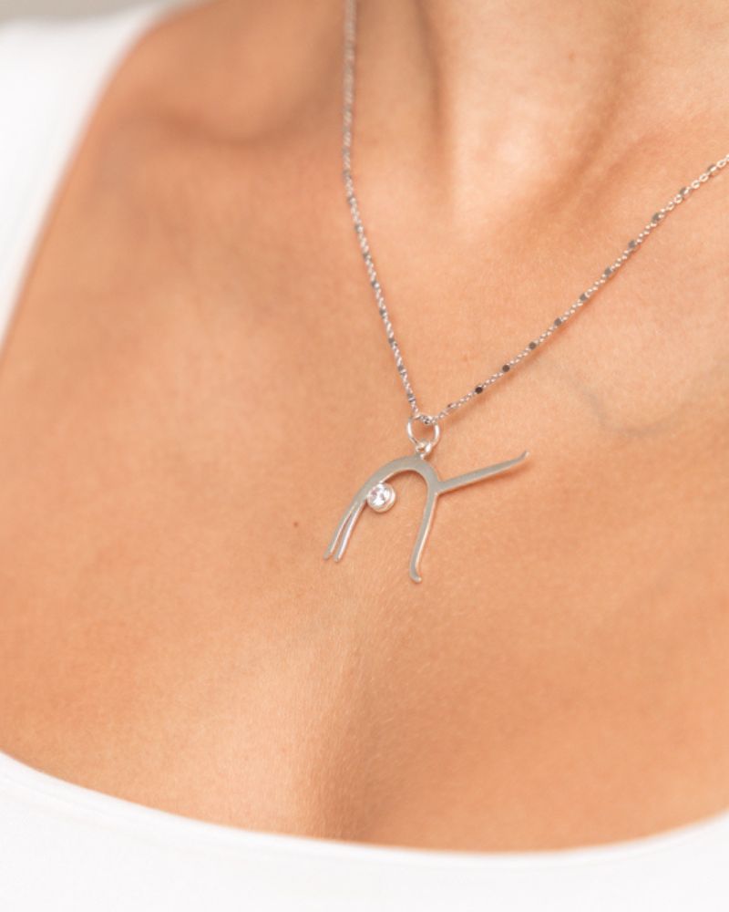 Colgante EKA PADA URDHVA DHANURASANA