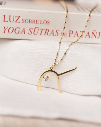 Colgante EKA PADA URDHVA DHANURASANA